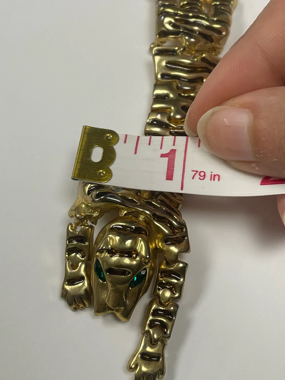 Vintage Articulated Gold-tone Prowling Panther Brooch with Green Eyes